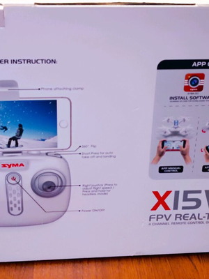 Syma X15W drone used with remote control and video mount