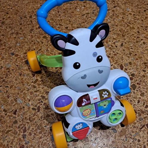 Fisher-Price Zebra educational walker used with interactive activities