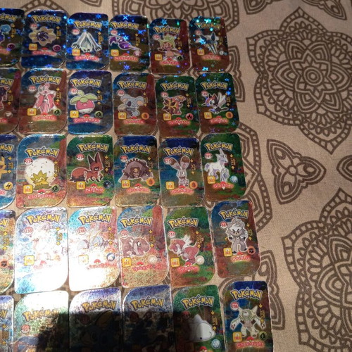 Pokemon metal tags like new, 43 pieces