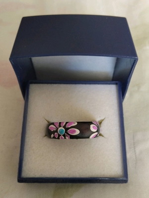 Ethnic wooden ring used with painted flower motifs