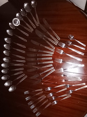 Solingen cutlery set incomplete with gold border on handles, used