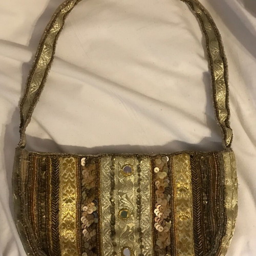 Small shoulder bag in gold colors like new