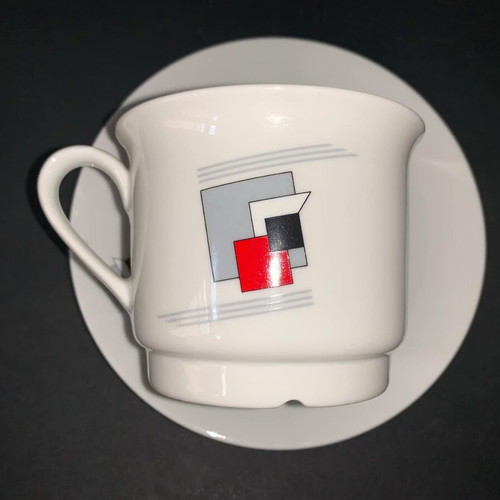Ionia porcelain cup used with two saucers