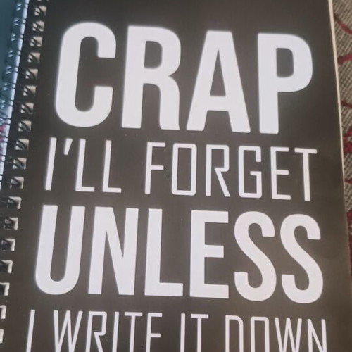 Spiral notebook A5, black with white letters