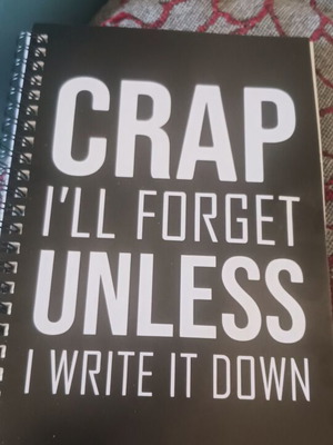 Spiral notebook A5, black with white letters