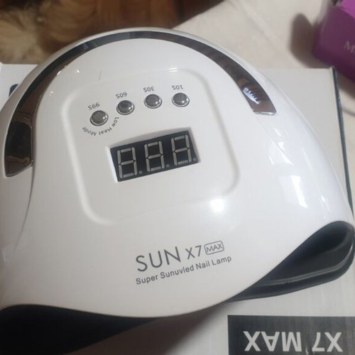 Professional manicure and pedicure set with nail lamp and tools