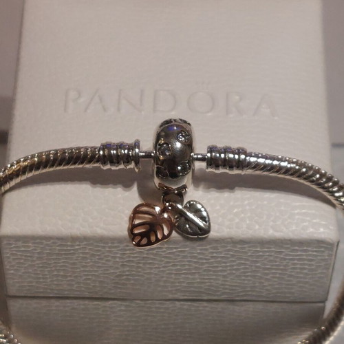 Pandora bracelet size 18 with round clasp and two leaf charms