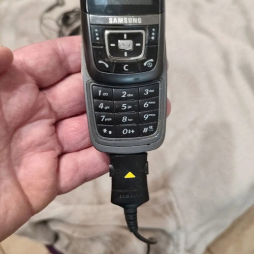 Samsung D600 phone like new with charger and hands free