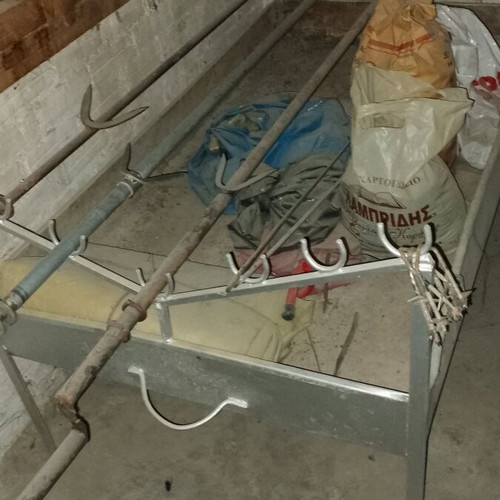 Barbecue, spits, other tools and charcoal used, lot