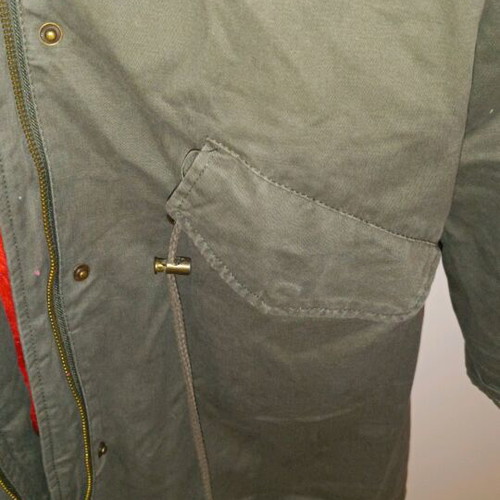 Khaki parka like new with red fur lining, size M