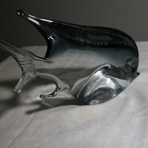 Glass decorative fish used with small tail chip