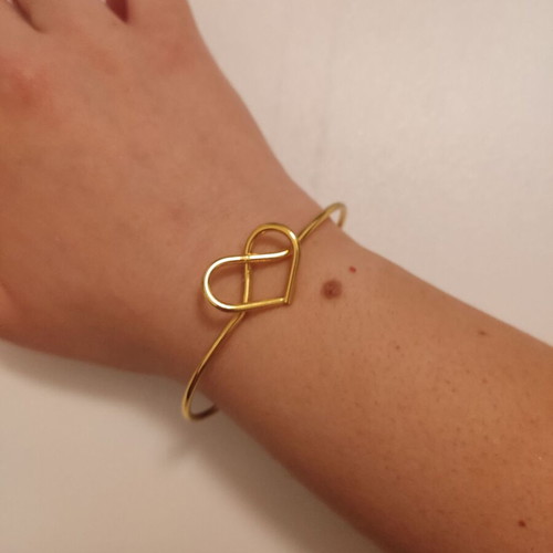 Stainless steel bracelets like new, pack of 4 with gift ring gold-colored