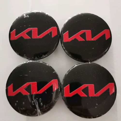 Kia 58mm wheel center caps new, black with red letters