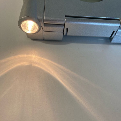 Spot Light electronic game used with built-in flashlight