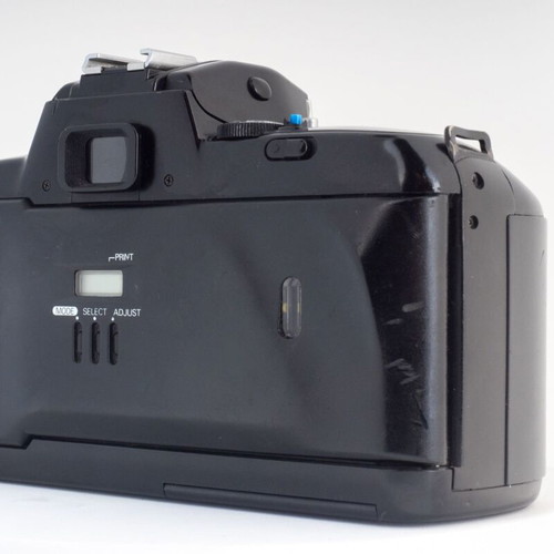 Nikon F-401X 35mm film camera with original leather strap