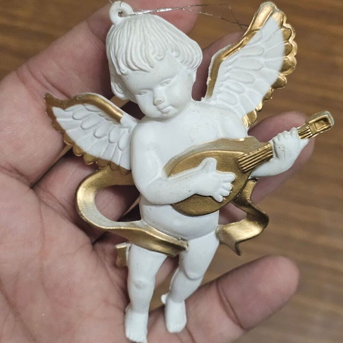 Decorative Angel used with fabric string for hanging
