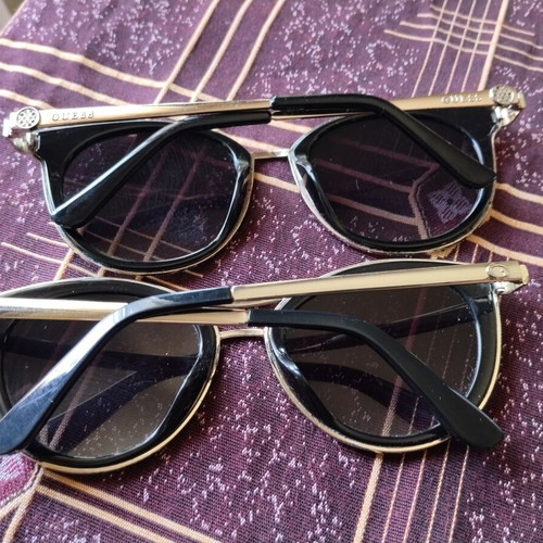 Guess women's sunglasses set used, black and gold, pack of 2