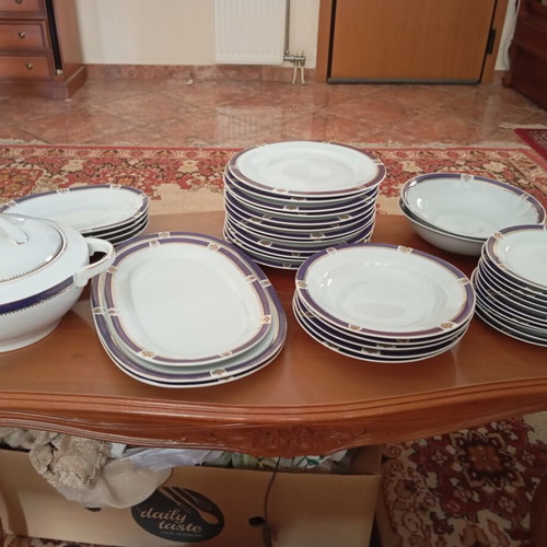 Dinnerware set like new with soup tureen, salad bowls, and plates