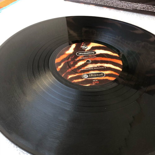 Prodigy Firestarter vinyl used, with partially worn cover