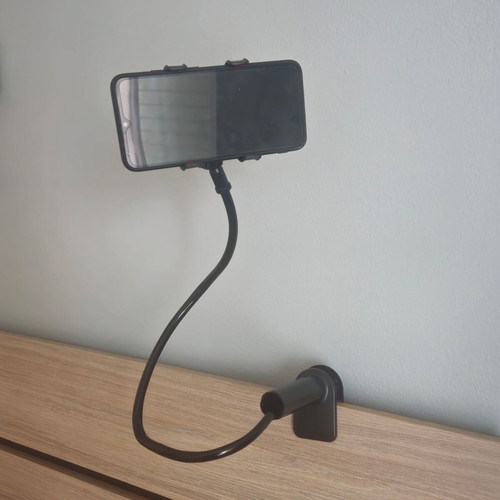 Mobile phone holder with flexible arm used, black
