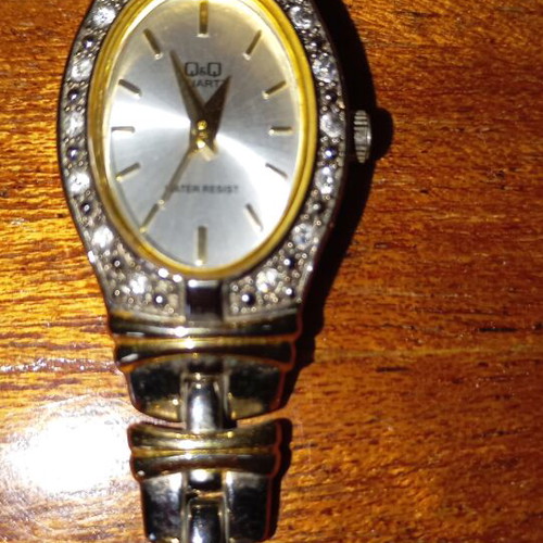 Wristwatch women's like new, gold and silver tones