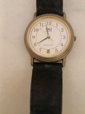 Q&Q men's watch used, silver, with date display