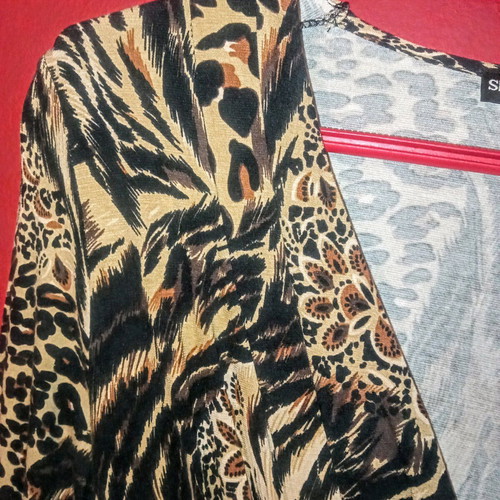 Animal print dress new with 3/4 sleeve and satin belt size medium/large