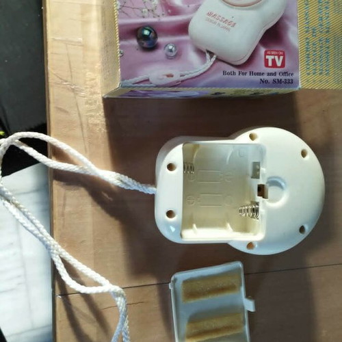 Portable Massage Device like new, battery operated, ergonomic design
