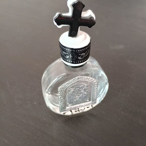 Small holy water bottle used