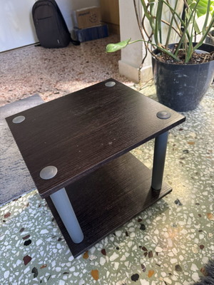 Small coffee table used with three broken legs