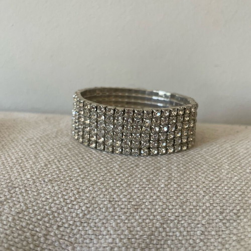 Bracelet with Crystals like new, silver color, elastic and sparkling