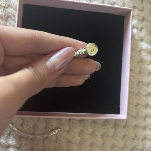 Pandora bracelet with 3 charms like new