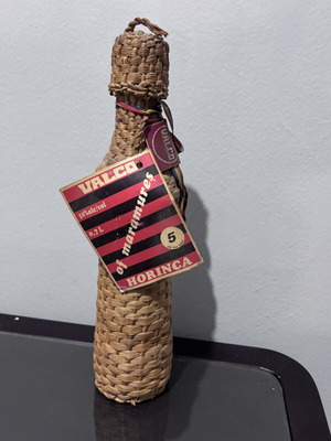Vintage Horinca of Maramures bottle 0.7L used with handmade straw cover