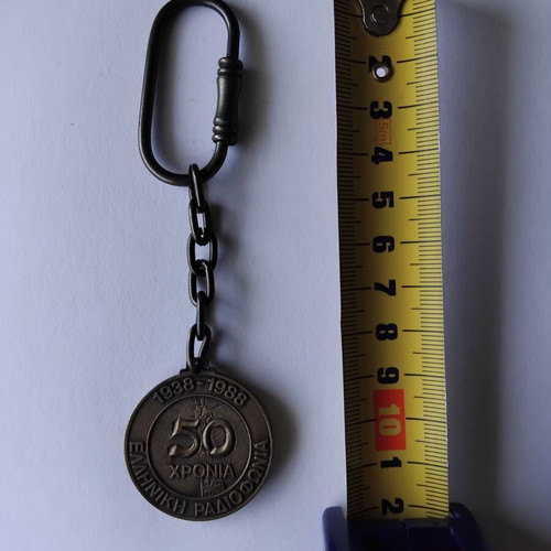 Collectible keychain used for 50 years of Greek Radio 1938-1988