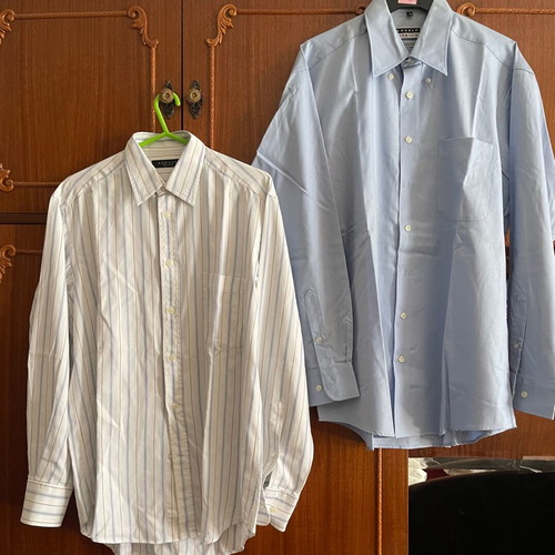 Men's dress shirts size L, set of 2, 1 new and 1 used