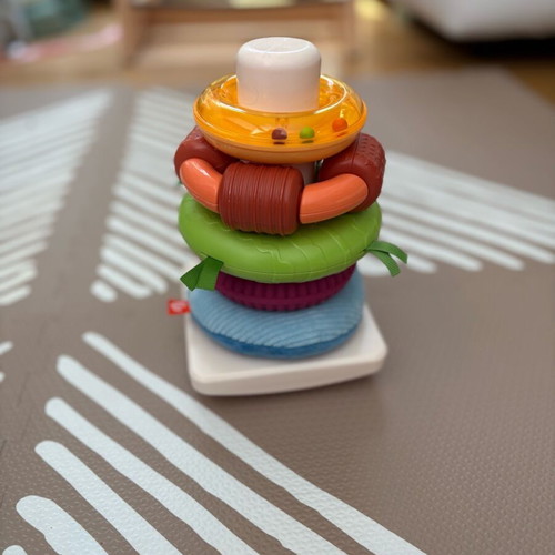 Fisher Price toy like new with rings in various textures