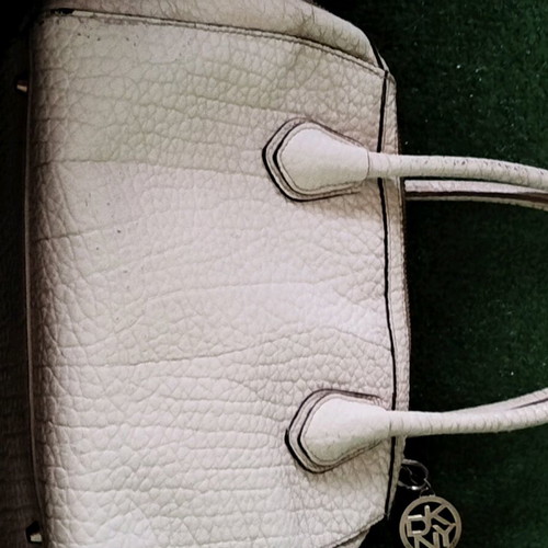 DKNY collectible handbag white and gold like new