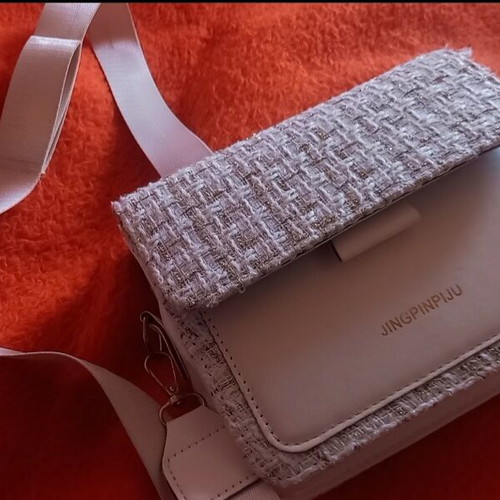 Beige shoulder bag with gold and white details like new