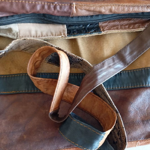 Crossbody bag made of suede used with signs of wear