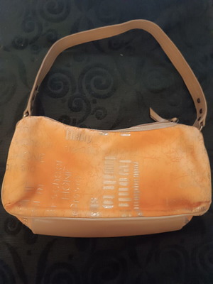 Women's shoulder bag like new, orange with gold text print