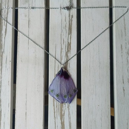 Necklace with floral talisman handmade with hibiscus petals, purple