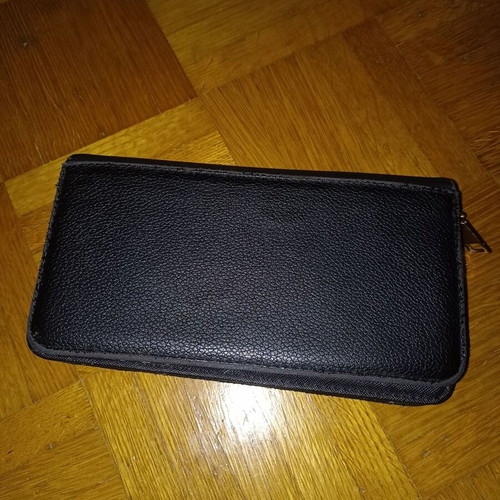 Black wallet slightly used with multiple compartments
