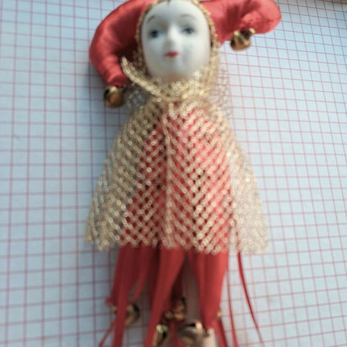 Decorative Harlequin figure on stick like new, red costume