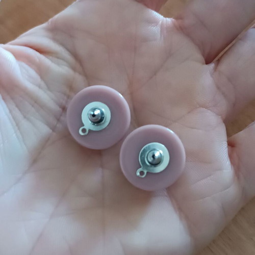 Plastic stud earrings set in lilac and dusty apple colors like new