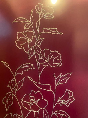 Embroidered painting like new with gold thread on red fabric