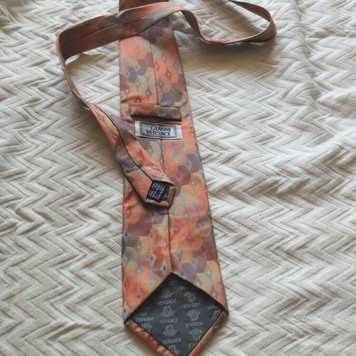 Gianni Versace tie like new, 100% silk, geometric diamond pattern