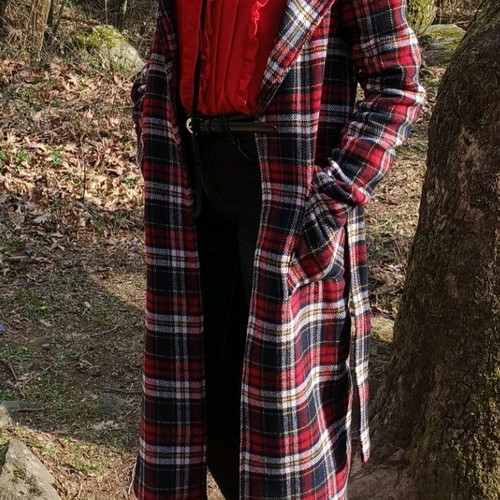 Checked coat size Small like new with belt and stitched pockets