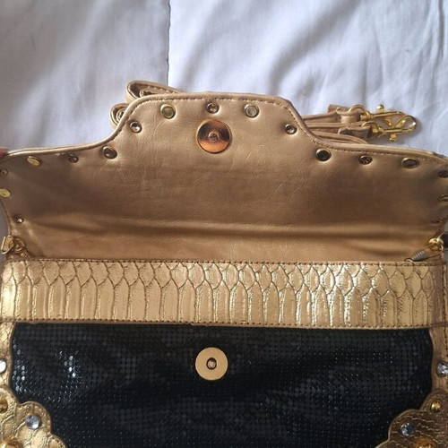 Evening bag like new, black with gold details
