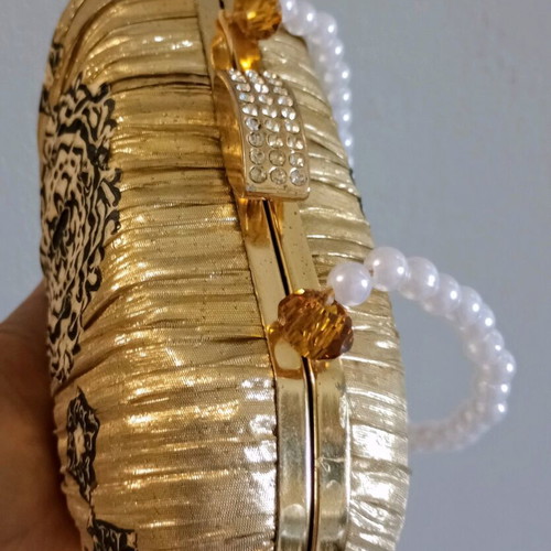 Clutch handbag refurbished, gold color