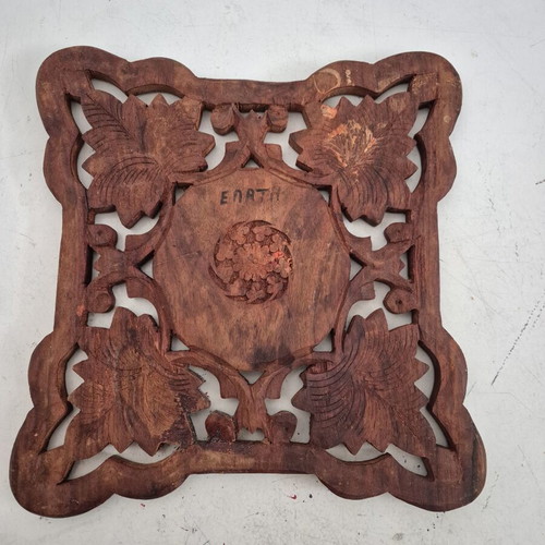 Handmade wooden carved decoration with embossed grapevine design